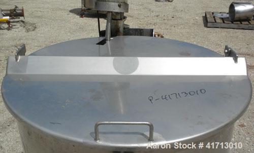 Used Tank, Approximate 140 Gallon, 316 Stainless Steel, Vertical.  34" diameter  x 36" straight side, flat top with hinged cover, sloped bottom.  Includes a clamp on agitator with a 1" diameter shaft...
