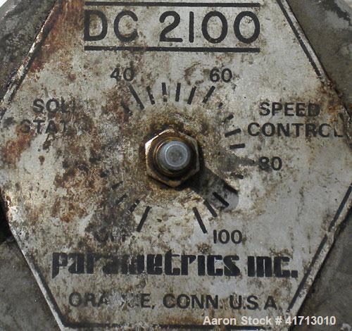 Used Tank, Approximate 140 Gallon, 316 Stainless Steel, Vertical.  34" diameter  x 36" straight side, flat top with hinged cover, sloped bottom.  Includes a clamp on agitator with a 1" diameter shaft...