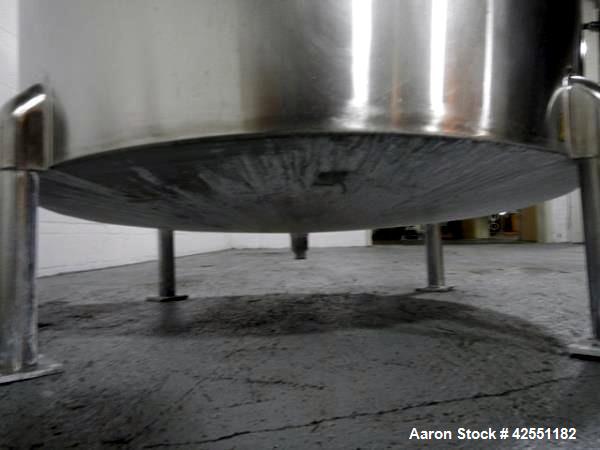 Used Bush Tank, 425 gallon, stainless steel construction, approximately 52" diameter x 48" straight side, open top with cover, flat slopping bottom, 2" bottom outlet, clamp on .5 hp, 230/460 volt Che...