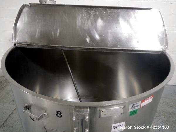 Used Bush Tank, 425 gallon, stainless steel construction, approximately 52" diameter x 48" straight side, open top with cover, flat slopping bottom, 2" bottom outlet, clamp on .5 hp, 230/460 volt Che...