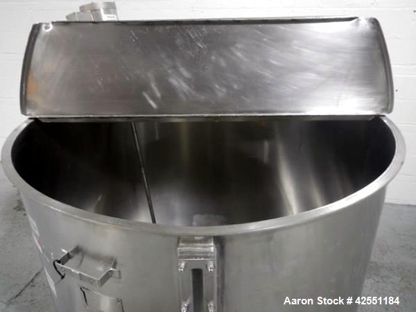 Used Bush Tank, 425 gallon, stainless steel construction, approximately 52" diameter x 48" straight side, open top with cover, flat slopping bottom, 2" bottom outlet, clamp on .5 hp, 230/460 volt Che...