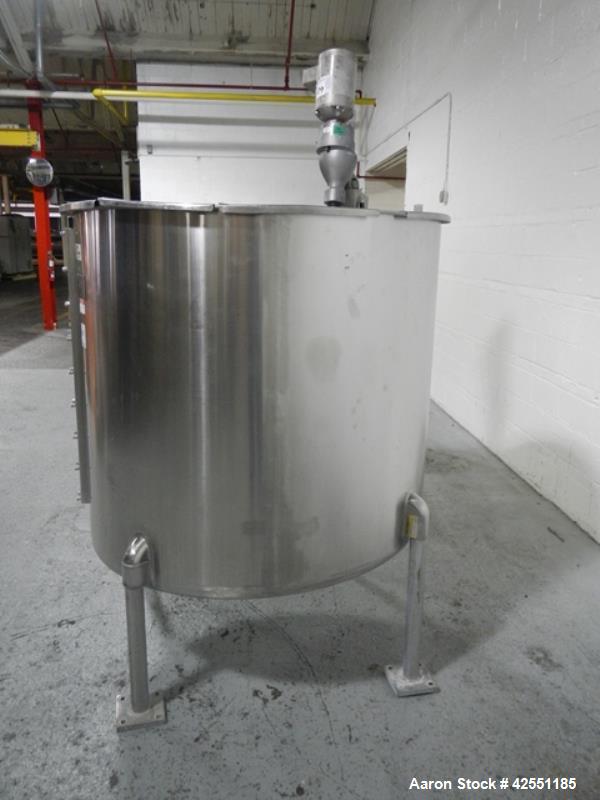 Used Bush Tank, 425 gallon, stainless steel construction, approximately 52" diameter x 48" straight side, open top with cover, flat slopping bottom, 2" bottom outlet, clamp on .5 hp, 230/460 volt Che...