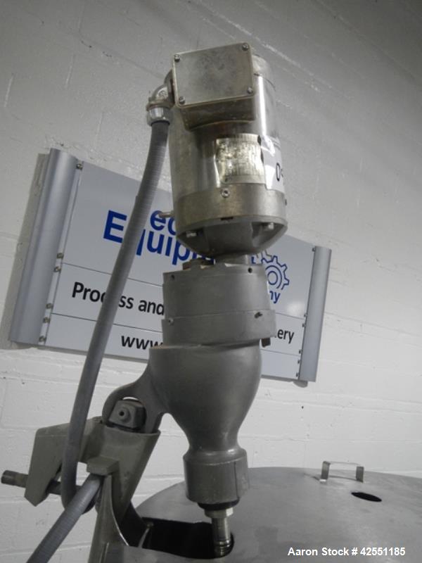 Used Bush Tank, 425 gallon, stainless steel construction, approximately 52" diameter x 48" straight side, open top with cover, flat slopping bottom, 2" bottom outlet, clamp on .5 hp, 230/460 volt Che...