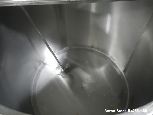 Used Bush Tank, 425 gallon, stainless steel construction, approximately 52" diameter x 48" straight side, open top with cover, flat slopping bottom, 2" bottom outlet, clamp on .5 hp, 230/460 volt Che...