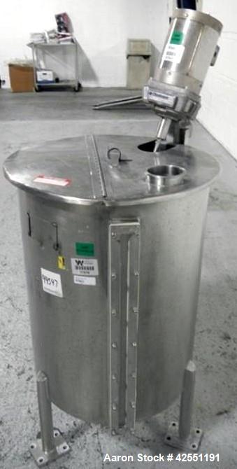 Used Bush Tank, 60 gallon, stainless steel construction, approximately 24" diameter x 32" straight side, open top with hinged cover, flat slopping bottom, 1" bottom outlet, clamp on .5 hp, 230/460 vo...