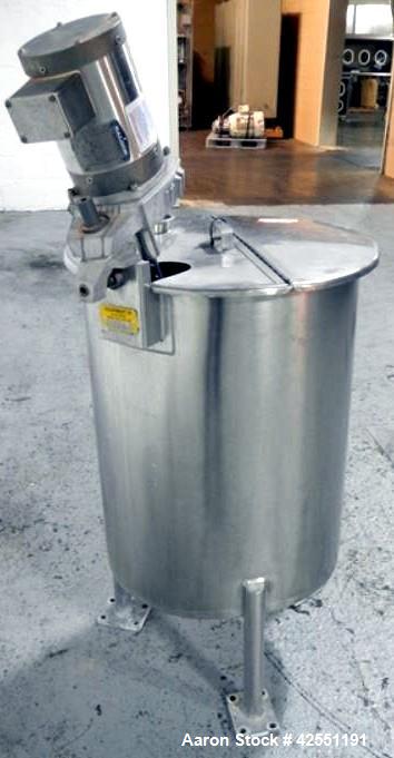 Used Bush Tank, 60 gallon, stainless steel construction, approximately 24" diameter x 32" straight side, open top with hinged cover, flat slopping bottom, 1" bottom outlet, clamp on .5 hp, 230/460 vo...
