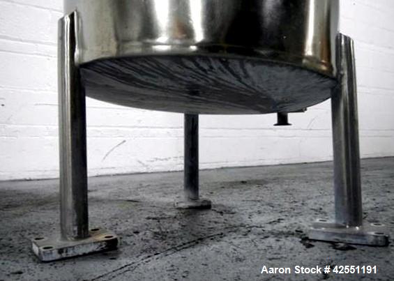 Used Bush Tank, 60 gallon, stainless steel construction, approximately 24" diameter x 32" straight side, open top with hinged cover, flat slopping bottom, 1" bottom outlet, clamp on .5 hp, 230/460 vo...