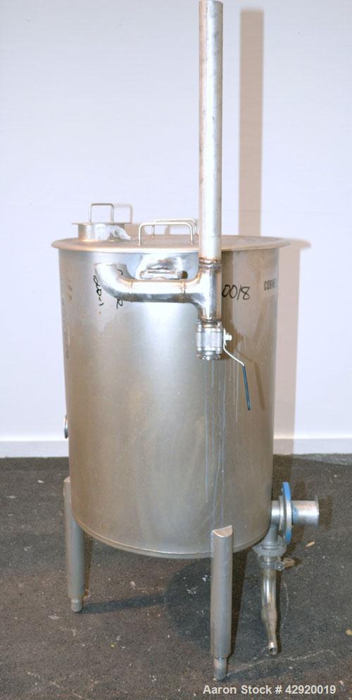 Used Tank, 110 Gallon, 304 Stainless Steel, Vertical. 30 Diameter x 36 straight side. Flat open top with a 1 piece cover, sloped bottom. Openings side 2 tri-clamp, 3 tri-clamp, 4 tri-clamp, 4 side bo...