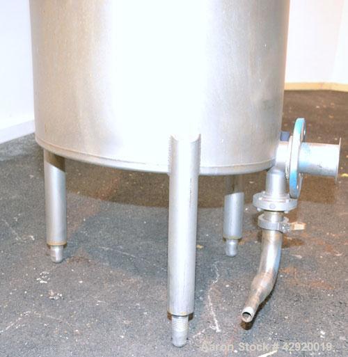 Used Tank, 110 Gallon, 304 Stainless Steel, Vertical. 30 Diameter x 36 straight side. Flat open top with a 1 piece cover, sloped bottom. Openings side 2 tri-clamp, 3 tri-clamp, 4 tri-clamp, 4 side bo...