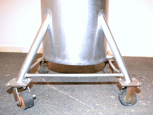 Used Tank, 30 Gallon, 316 Stainless Steel, Vertical. 17-1/2" Diameter x 30" straight side. Open top, no cover, sloped bottom. 1-1/2" Center bottom outlet. Mounted on 4 stainless steel legs with caste...