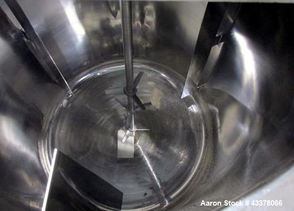 Used Tank, 100 Gallon, Stainless Steel. Approximately 30" diameter x 36" straight side, flat top, dished bottom, top entering 1.74 hp Lightnin agitator, model XD-174, with (3) tier (3) blade agitator...