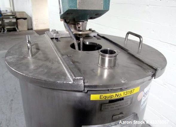 Used Flo Bin Mix Tank, 63 Gallon, Stainless Steel. Approximately 22" diameter x 36" straight side, open top with cover, dish bottom, 3 baffles, Lightnin clamp on agitator, model xd-87, .87 hp, 208-22...