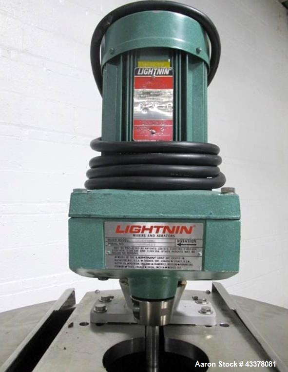 Used Tank, 100 Gallon, Stainless Steel. Approximately 30" diameter x 36" straight side, flat top, dished bottom, top entering 1.74 hp Lightnin agitator, model XD-174, with (3) tier (3) blade agitator...