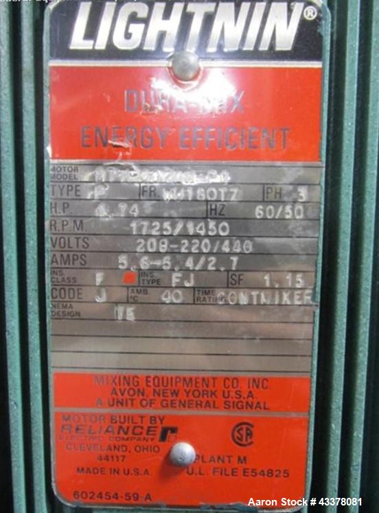 Used Tank, 100 Gallon, Stainless Steel. Approximately 30" diameter x 36" straight side, flat top, dished bottom, top entering 1.74 hp Lightnin agitator, model XD-174, with (3) tier (3) blade agitator...