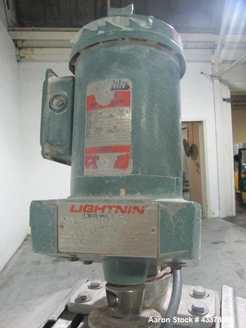 Used Flo Bin Mix Tank, 63 Gallon, Stainless Steel. Approximately 22" diameter x 36" straight side, open top with cover, dish bottom, 3 baffles, Lightnin clamp on agitator, model xd-87, .87 hp, 208-22...