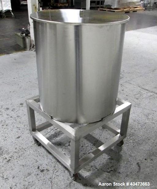 Used 75 gallon portable mix tank, stainless steel construction, 28" diameter x 30" straight side, open top, flat bottm, 1.5" center bottm outlet, on cart.