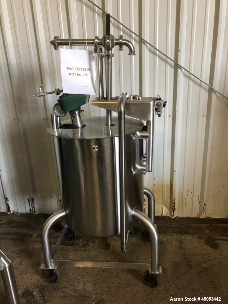 Used Permasan 44 Gallon SIngle Wall Stainless Steel Tank with Lightnin Mixer Modes XDA33. Mounted on casters with bottom valve.