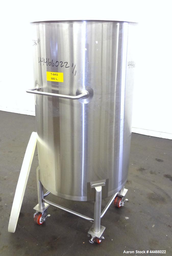 Used Tank, 132 Gallon (500 Liter), 316 Stainless Steel, Vertical. Approximate 30" diameter x 47-1/2" straight side, open top with a 1 piece plastic cover, coned bottom. 1" Center bottom outlet. Mount...