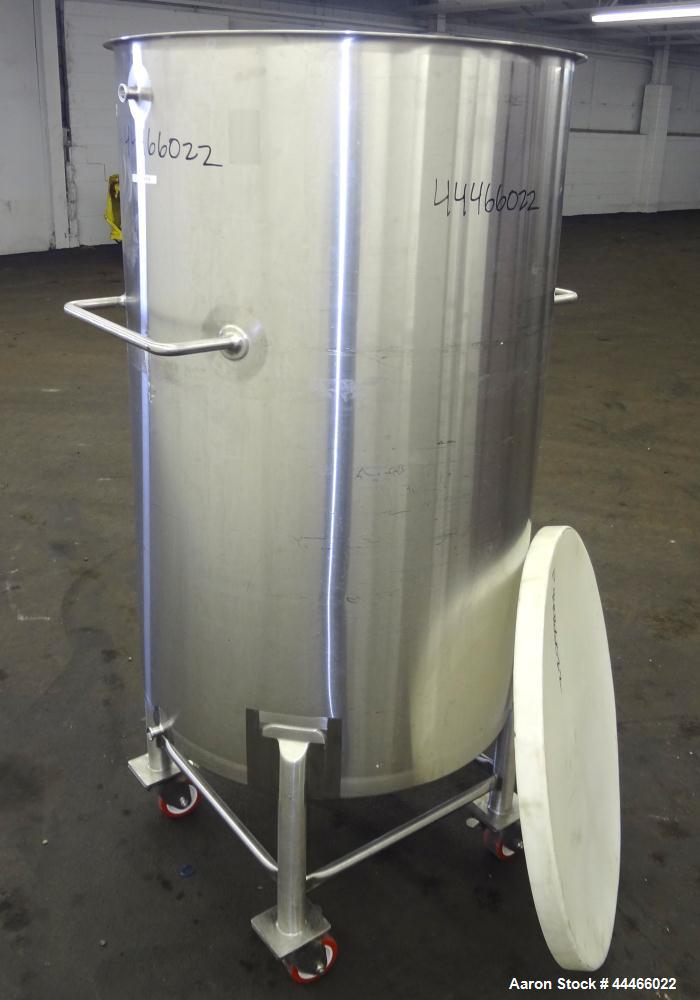 Used Tank, 132 Gallon (500 Liter), 316 Stainless Steel, Vertical. Approximate 30" diameter x 47-1/2" straight side, open top with a 1 piece plastic cover, coned bottom. 1" Center bottom outlet. Mount...