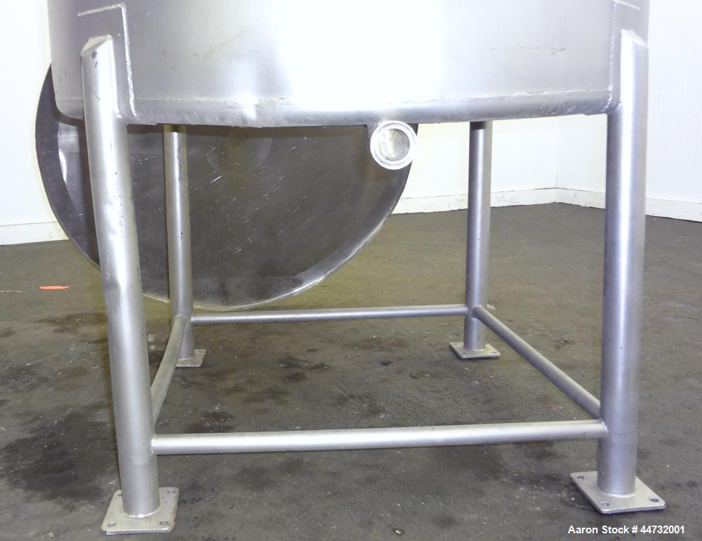 Used Tank, 125 Gallon, 304 Stainless Steel, Vertical. Approximately 38" diameter x 27" straight side. Flat open top with a 1 piece cover, sloped bottom. 1-1/2" Tri-clamp off center bottom outlet. Mou...