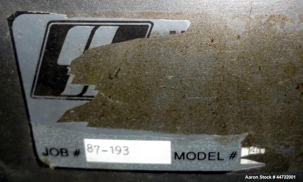 Used Tank, 125 Gallon, 304 Stainless Steel, Vertical. Approximately 38" diameter x 27" straight side. Flat open top with a 1 piece cover, sloped bottom. 1-1/2" Tri-clamp off center bottom outlet. Mou...