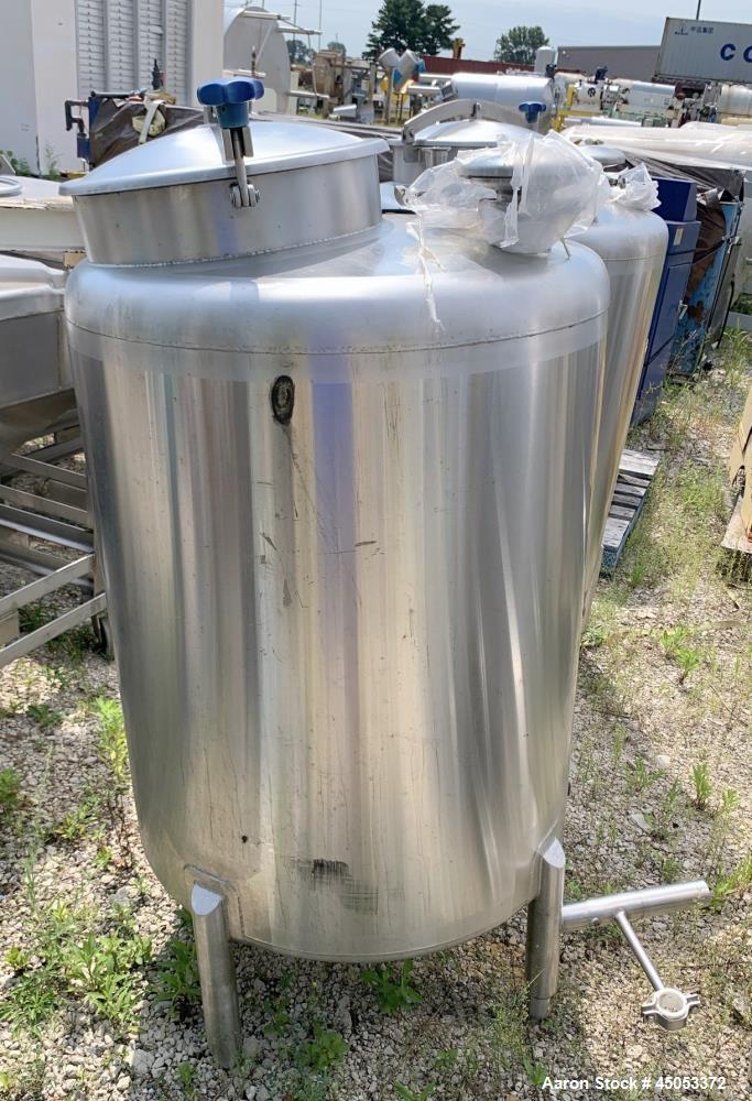 Used Stainless Steel Tank, Approximate 135 Gallon, 304 Stainless Steel, Vertical. Approximate 33" diameter x 37" straight side. Dished top, sloped bottom. Openings: 16" manway with cover, (2) 3", 1",...