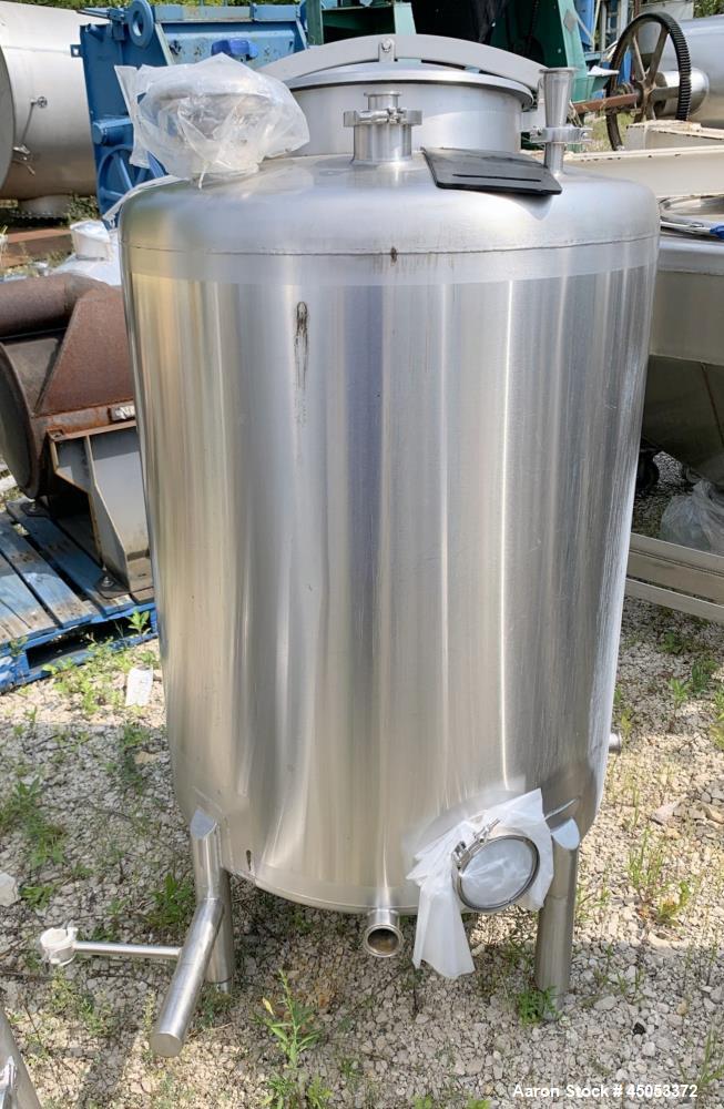 Used Stainless Steel Tank, Approximate 135 Gallon, 304 Stainless Steel, Vertical. Approximate 33" diameter x 37" straight side. Dished top, sloped bottom. Openings: 16" manway with cover, (2) 3", 1",...