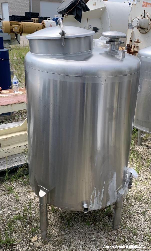 Used Stainless Steel Tank, Approximate 135 Gallon, 304 Stainless Steel, Vertical. Approximate 33" diameter x 37" straight side. Dished top, sloped bottom. Openings: 16" manway with cover, (2) 3", 1",...