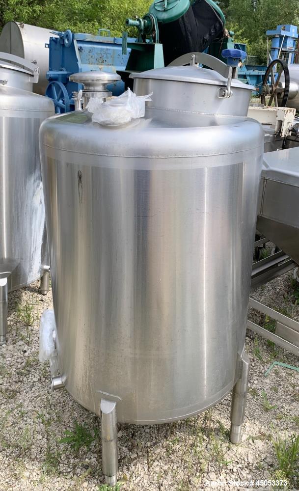 Used Stainless Steel Tank, Approximate 135 Gallon, 304 Stainless Steel, Vertical. Approximate 33" diameter x 37" straight side. Dished top, sloped bottom. Openings: 16" manway with cover, (2) 3", 1",...