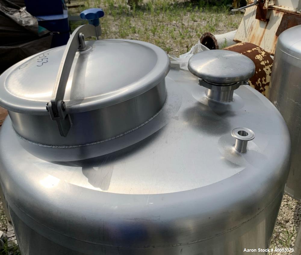 Used Stainless Steel Tank, Approximate 135 Gallon, 304 Stainless Steel, Vertical. Approximate 33" diameter x 37" straight side. Dished top, sloped bottom. Openings: 16" manway with cover, (2) 3", 1",...