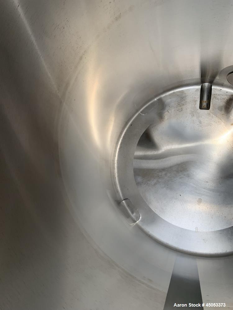 Used Stainless Steel Tank, Approximate 135 Gallon, 304 Stainless Steel, Vertical. Approximate 33" diameter x 37" straight side. Dished top, sloped bottom. Openings: 16" manway with cover, (2) 3", 1",...