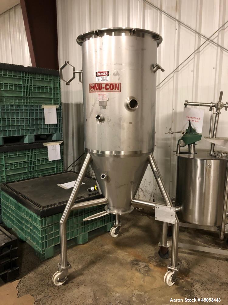 Used-Nu-Con Model NCVR-18-8-3T Stainless Steel Tank. Unit is mounted on casters, serial number: N08060-GA-106. 304 stainless...