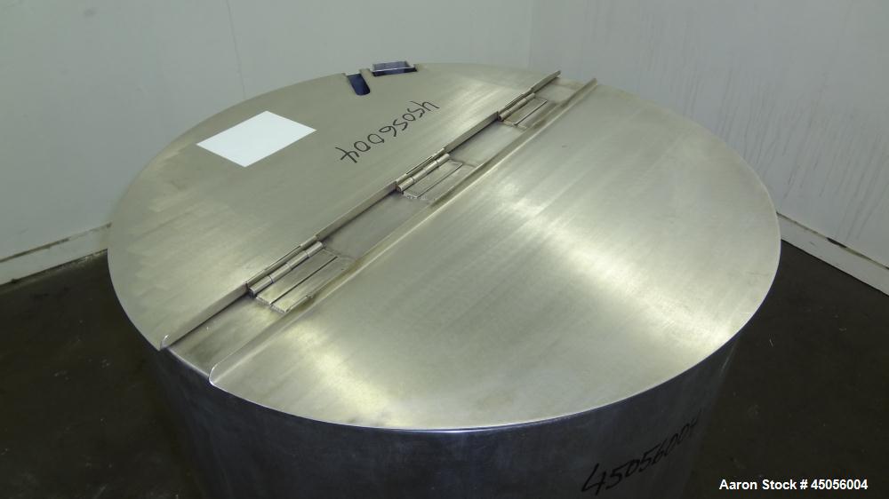 Used Tank, 80 Gallon, 304 Stainless Steel, Vertical. Approximately 30-1/2" diameter x 27" straight side, open top with (2) half hinged covers, provision for a clamp on agitator. 2" Side bottom outlet...