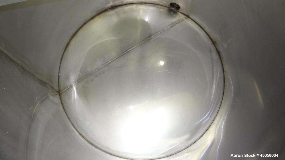 Used Tank, 80 Gallon, 304 Stainless Steel, Vertical. Approximately 30-1/2" diameter x 27" straight side, open top with (2) half hinged covers, provision for a clamp on agitator. 2" Side bottom outlet...