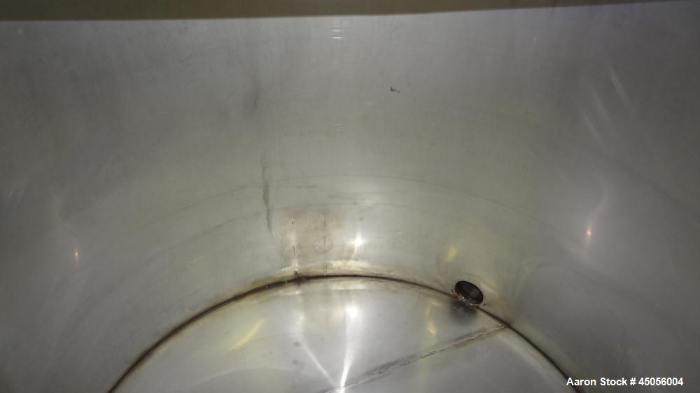 Used Tank, 80 Gallon, 304 Stainless Steel, Vertical. Approximately 30-1/2" diameter x 27" straight side, open top with (2) half hinged covers, provision for a clamp on agitator. 2" Side bottom outlet...