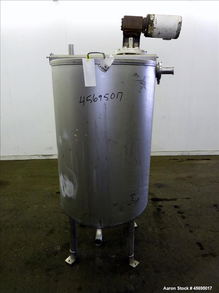 Used Tank, Approximately 150 Gallon, Stainless Steel, Vertical. 31" Diameter x 46" straight side, flat top with a 1/3 hinged cover, sloped bottom. Off center top mounted agitator with a 1-1/4" diamet...