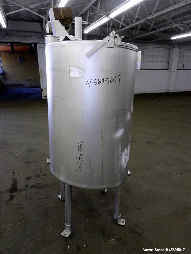 Used Tank, Approximately 150 Gallon, Stainless Steel, Vertical. 31" Diameter x 46" straight side, flat top with a 1/3 hinged cover, sloped bottom. Off center top mounted agitator with a 1-1/4" diamet...
