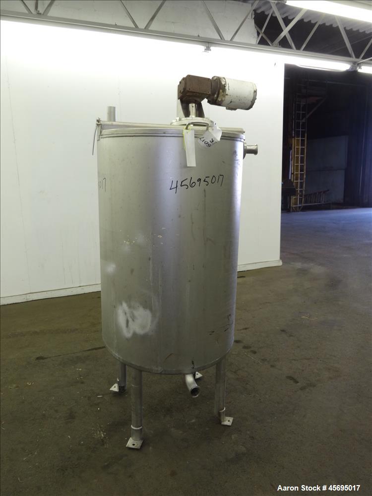 Used Tank, Approximately 150 Gallon, Stainless Steel, Vertical. 31" Diameter x 46" straight side, flat top with a 1/3 hinged cover, sloped bottom. Off center top mounted agitator with a 1-1/4" diamet...