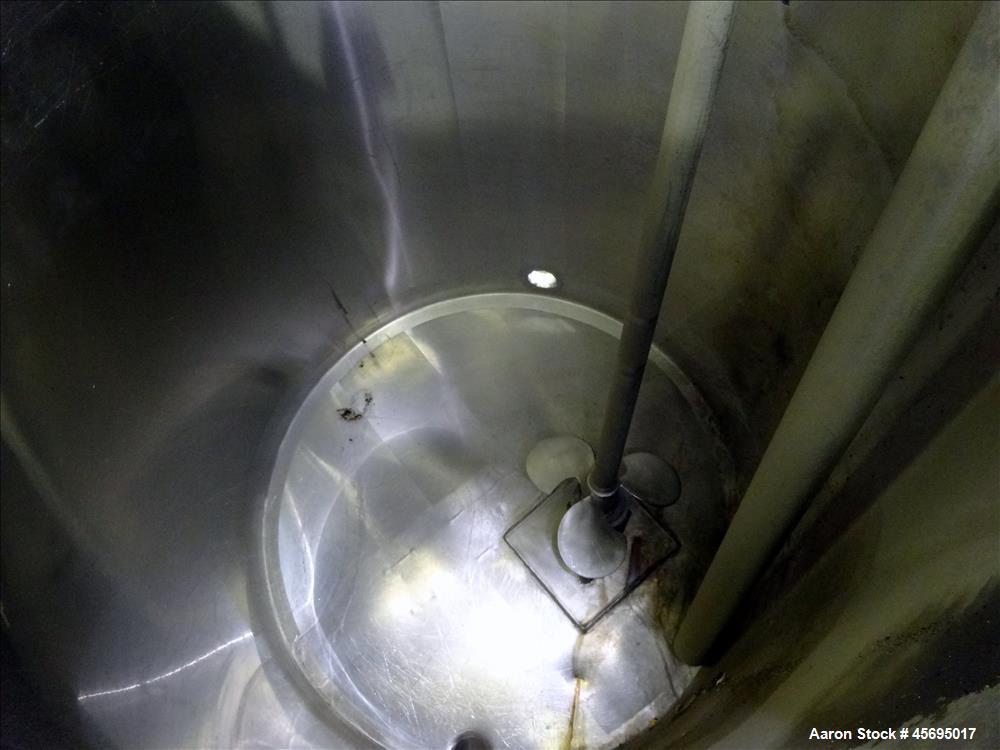 Used Tank, Approximately 150 Gallon, Stainless Steel, Vertical. 31" Diameter x 46" straight side, flat top with a 1/3 hinged cover, sloped bottom. Off center top mounted agitator with a 1-1/4" diamet...