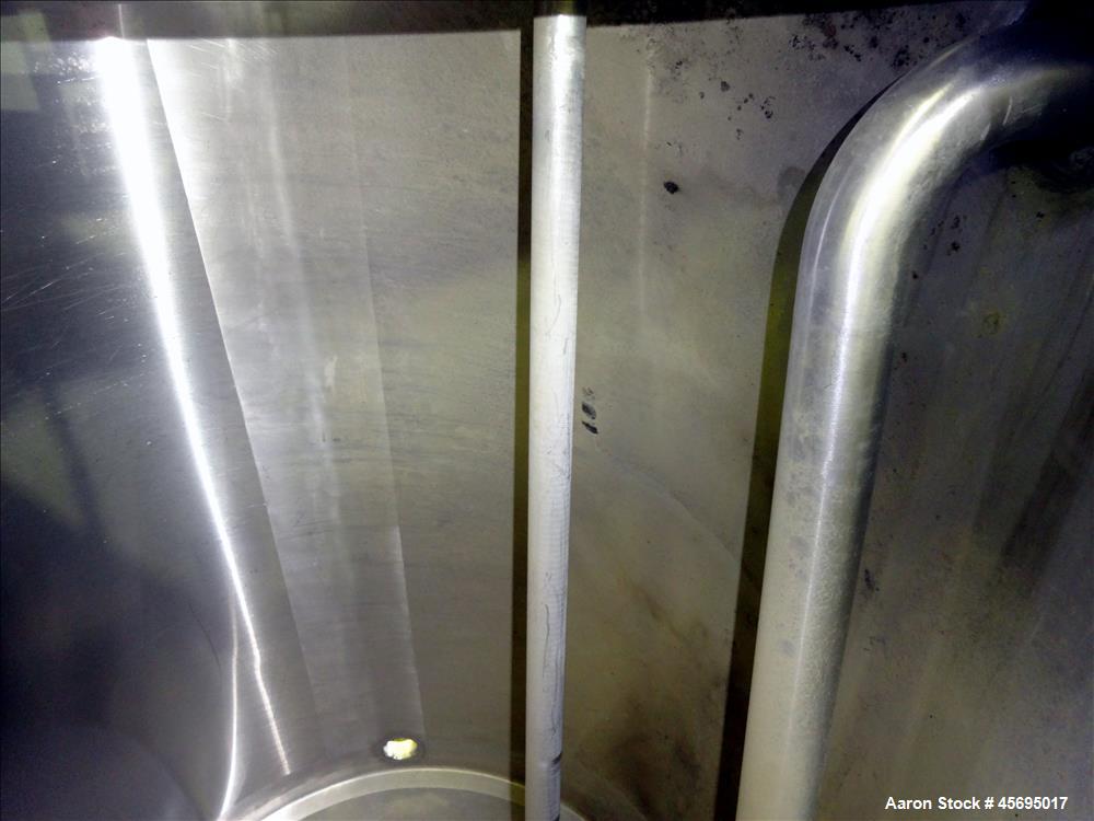 Used Tank, Approximately 150 Gallon, Stainless Steel, Vertical. 31" Diameter x 46" straight side, flat top with a 1/3 hinged cover, sloped bottom. Off center top mounted agitator with a 1-1/4" diamet...