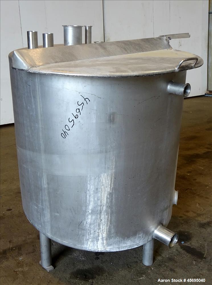 Used Tank, Approximately 140 Gallon, Stainless Steel, Vertical. 36" Diameter x 34" straight side, flat top, 1/3 hinged cover, sloped bottom. Openings top 1-1/2" tri-clamp, (2) 2", 2" tri-clamp, 4" tr...