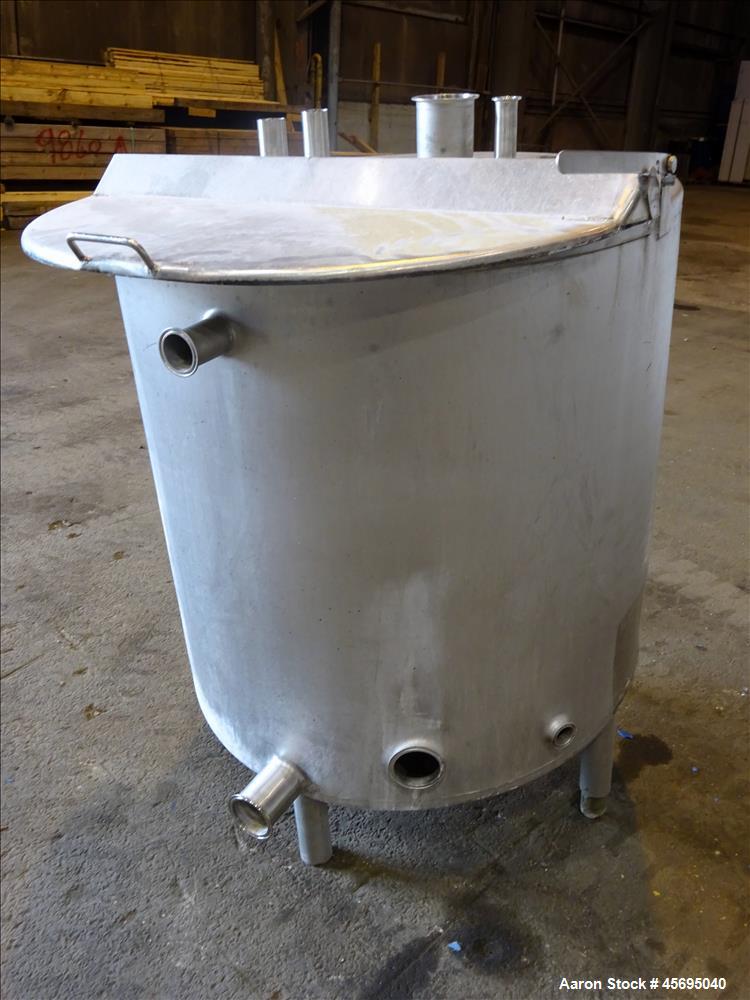 Used Tank, Approximately 140 Gallon, Stainless Steel, Vertical. 36" Diameter x 34" straight side, flat top, 1/3 hinged cover, sloped bottom. Openings top 1-1/2" tri-clamp, (2) 2", 2" tri-clamp, 4" tr...