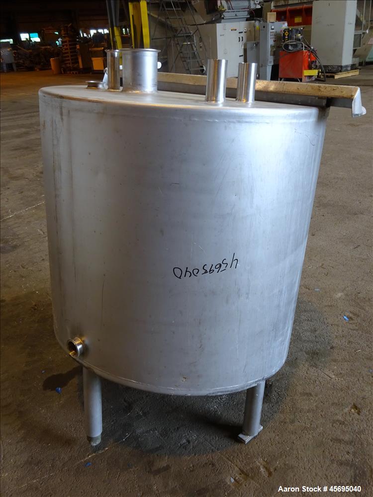 Used Tank, Approximately 140 Gallon, Stainless Steel, Vertical. 36" Diameter x 34" straight side, flat top, 1/3 hinged cover, sloped bottom. Openings top 1-1/2" tri-clamp, (2) 2", 2" tri-clamp, 4" tr...