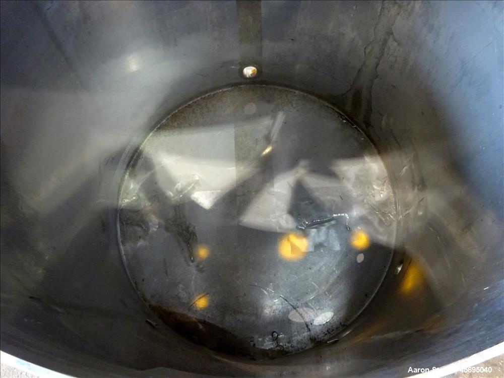 Used Tank, Approximately 140 Gallon, Stainless Steel, Vertical. 36" Diameter x 34" straight side, flat top, 1/3 hinged cover, sloped bottom. Openings top 1-1/2" tri-clamp, (2) 2", 2" tri-clamp, 4" tr...