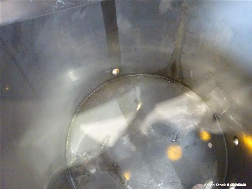 Used Tank, Approximately 140 Gallon, Stainless Steel, Vertical. 36" Diameter x 34" straight side, flat top, 1/3 hinged cover, sloped bottom. Openings top 1-1/2" tri-clamp, (2) 2", 2" tri-clamp, 4" tr...