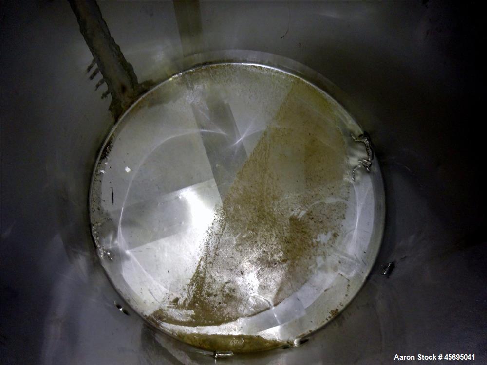 Used Tank, Approximately 140 Gallon, Stainless Steel, Vertical. 36" Diameter x 34" straight side, flat top with a 1/3 hinged cover, sloped bottom. Openings top (2) 2", 2" tri-clamp, 4" tri-clamp. Sid...