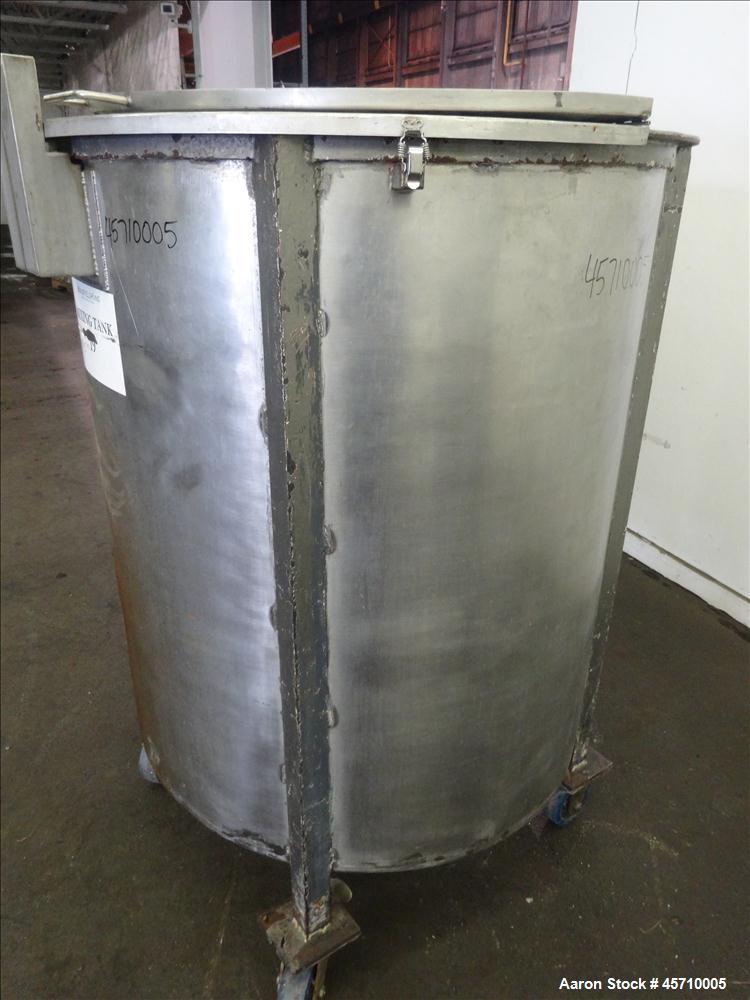 Used Tank, Approximately 200 Gallon, 304 Stainless Steel, Vertical. 37-1/2" Diameter x 45" straight side, flat open top with a hinged cover, sloped bottom. Provision for a clamp on agitator. 1-3/4" S...