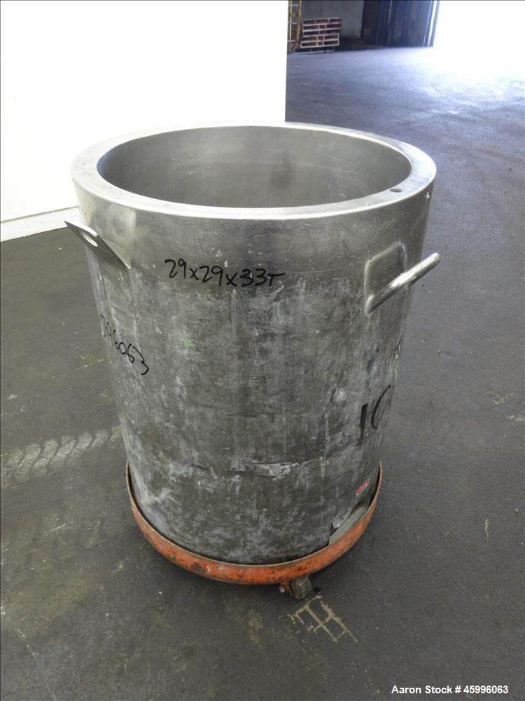 Used Tank, Approximate 30 Gallon, 304 Stainless Steel, Jacketed, Vertical. 20" diameter x 26" straight side. Pitched sloped bottom, open top, with a 2" side bottom outlet. Includes attached heating e...