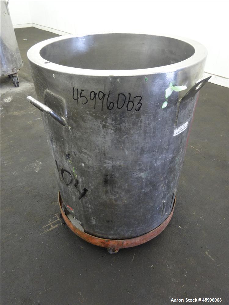 Used Tank, Approximate 30 Gallon, 304 Stainless Steel, Jacketed, Vertical. 20" diameter x 26" straight side. Pitched sloped bottom, open top, with a 2" side bottom outlet. Includes attached heating e...