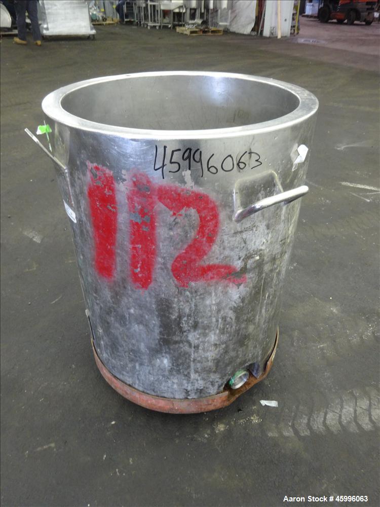 Used Tank, Approximate 30 Gallon, 304 Stainless Steel, Jacketed, Vertical. 20" diameter x 26" straight side. Pitched sloped bottom, open top, with a 2" side bottom outlet. Includes attached heating e...